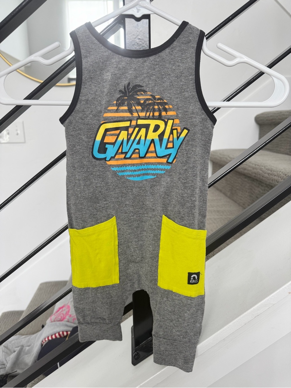 “Rags” Gnarly Graphic Grey Romper with Neon Yellow Pockets